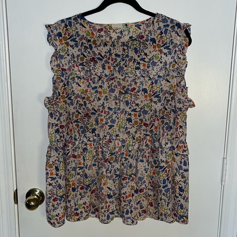Cute sleeveless ruffled flower print blush blouse